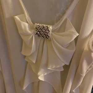 Sheer white blouse with ribbon accent